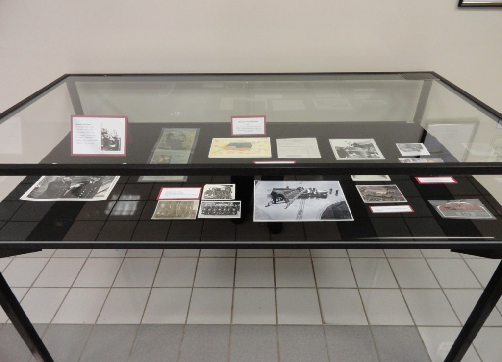 The left case displays items from the second half of the 20th century.