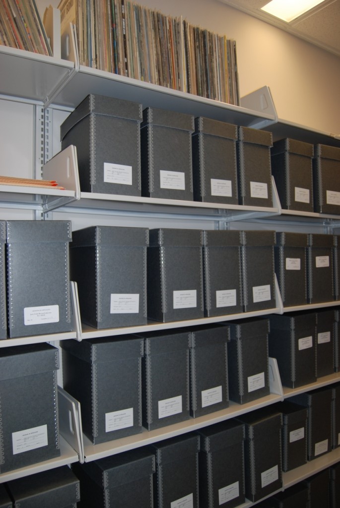Vinyl albums are stored in specially made archival boxes.