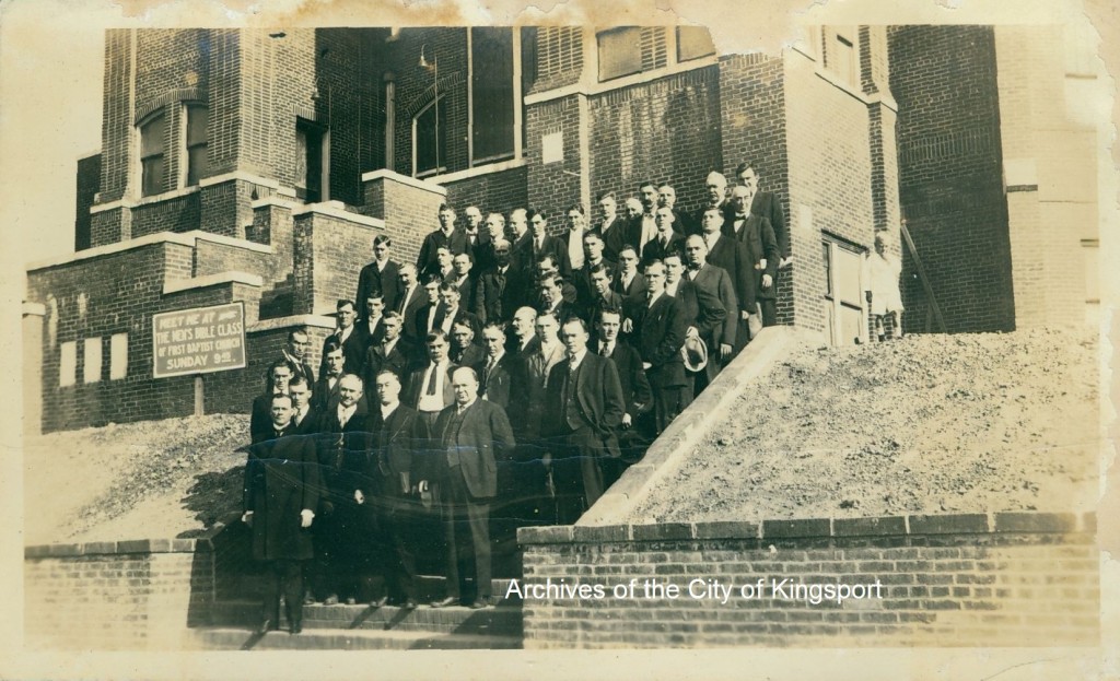 Rev. Doc Clifford is second from the right in the first row (standing next to Winston Churchill).