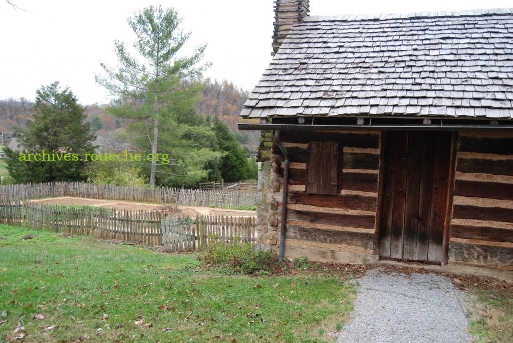 Slave cabin stands sentinel over the main garden.